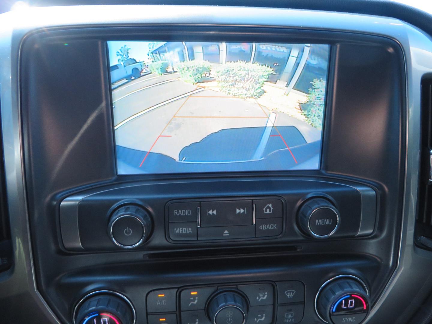 2018 White /BLACK Chevrolet Silverado 1500 LT (3GCPCREC7JG) with an 5.3L V8 OHV 16V engine, automatic transmission, located at 2630 Grass Valley Highway, Auburn, CA, 95603, (530) 508-5100, 38.937893, -121.095482 - Must see Pre Runner.... CST front lift spindals, Camburg UCA's, King Adjustable 2.5 Coil-overs, King 2.5 rear shocks, 35" Toyo RT Trail tires, 17" Method Race wheels, MZ front skid plate, G2 rear differntail cover, Full size bed mounted spare tire, Black Vinyl roof wrap, smoke tail lights and 3rd br - Photo#29